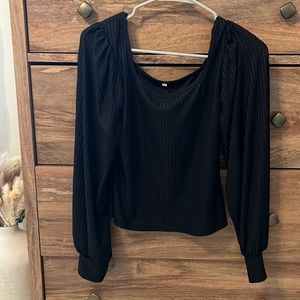 Long sleeve ribbed black blouse.
